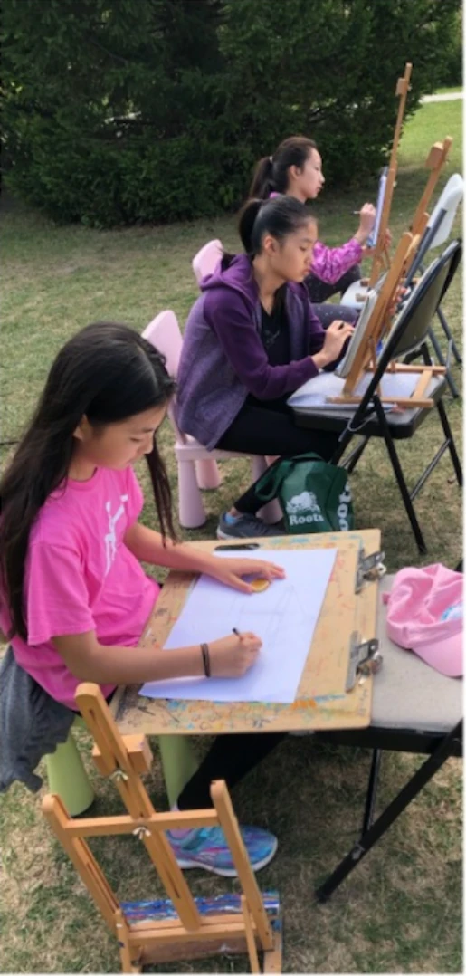 Outdoor group activity at XinYi Class