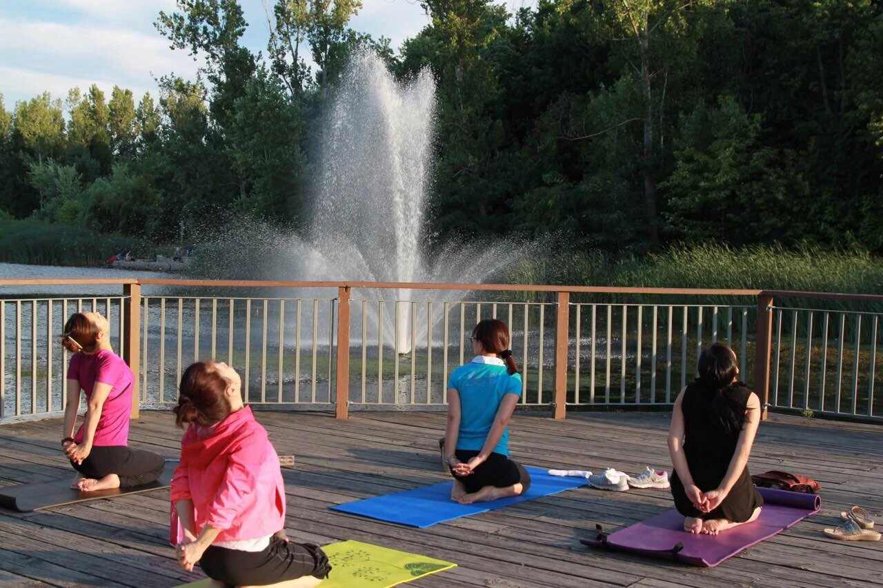 Outdoor yoga practice by the lake